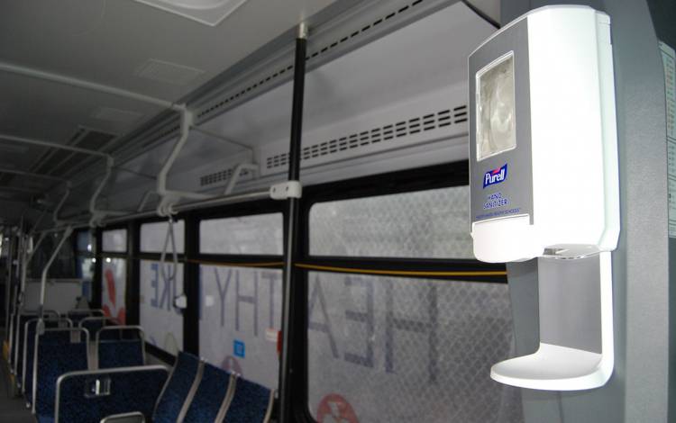 Dispensers filled with hand sanitizer will now be found at the entrances of all of Duke's large buses. Photo by Stephen Schramm.