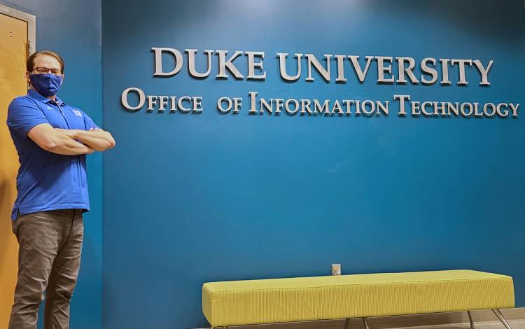Christian Holder works from the Duke OIT office in the American Tobacco Campus to collect deliveries of new laptops, printers and other devices to support the university-wide tech needs. Photo courtesy of Christian Holder. 