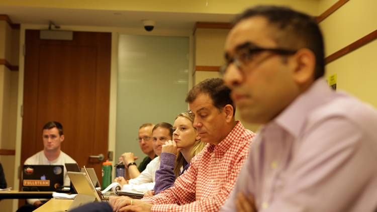 Duke undergraduates and military fellows mix in Tim Nichols' class on intelligence failure. Photo by Julie Schoonmaker