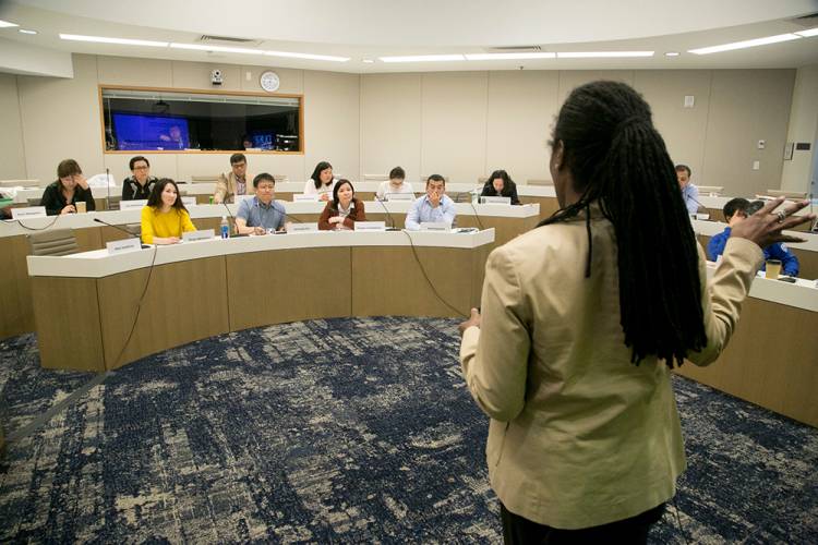 Fuqua Professor Ashleigh Rosette leads a discussion with Kazakh students. Photo by Duke Photography