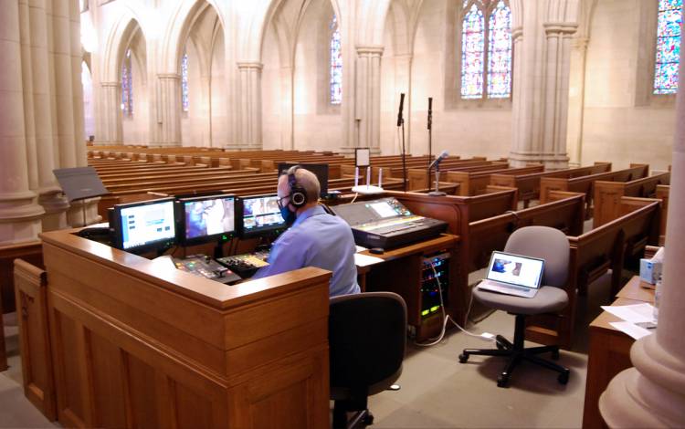 Duke Chapel Communications Manager James Todd produces the broadcast of the service by himself. Photo by Stephen Schramm.