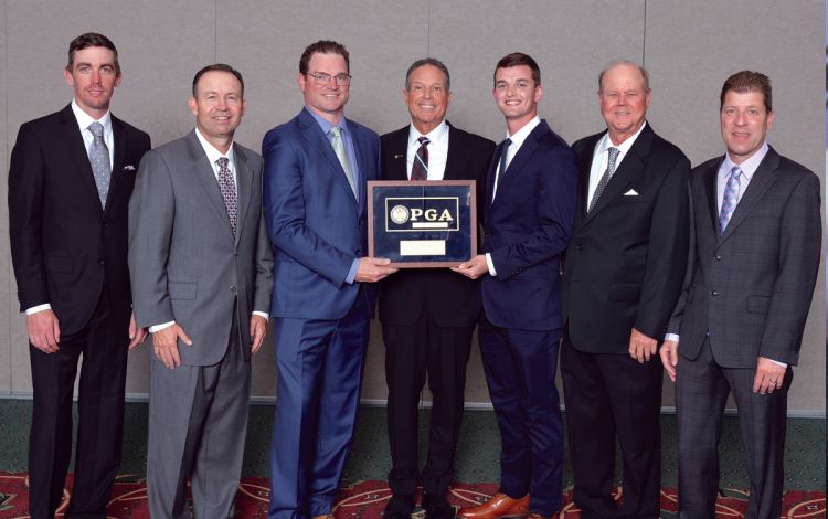 Ed Ibarguen, center, was surrounded by friends and colleagues when he was inducted into the PGA Hall of Fame earlier this year. Photo courtesy of Ed Ibarguen.