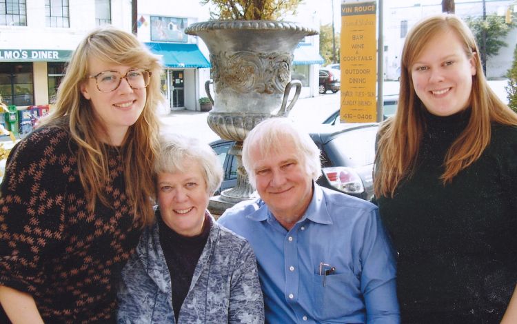 Blake Wilson third from left, enjoys time with his wife Doris Rouse, second from left, who he met when they were both Duke undergrads, and their daughters Nadia, left, and Blair, right. Photo courtesy of Blake Wilson.