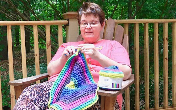 During the pandemic, Katrina Greely has found peace while crocheting on her back deck. Photo courtesy of Katrina Greely.