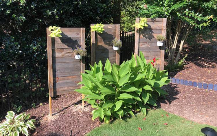 Helen Cuccaro used pallets that held sod and created privacy panels for her garden. Photo courtesy of Helen Cuccaro.