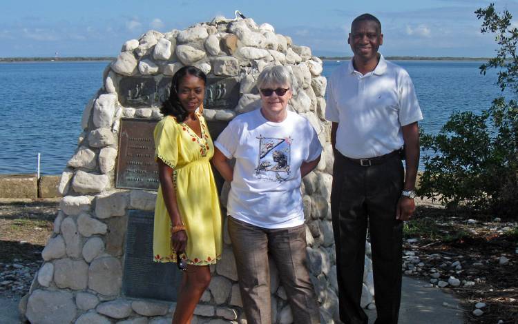 Holly Ackerman, center, with  Terence Peck, former spokesman for U.S. Naval Station Guantanamo Bay, and his wife Regina in Guantanamo. Photo courtesy of Holly Ackerman.