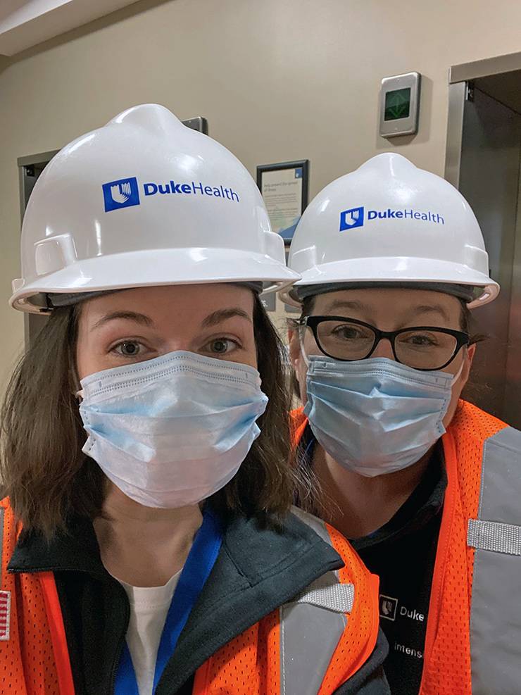 Duke Regional Hospital colleagues Hope Williams, left, and Amy Wright, right, enjoy a tour of the hospital's new wing. Photo courtesy of Hope Williams.