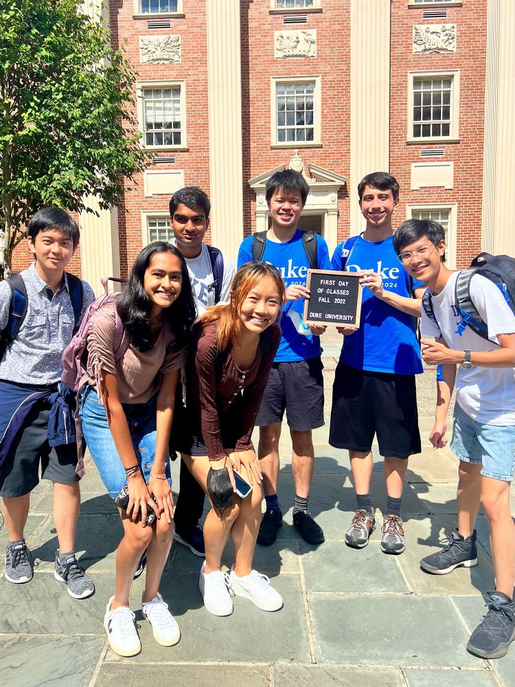 Students stand behind a letterboard declaring the first day of classes at Duke University in 2022. (Anna Lee)