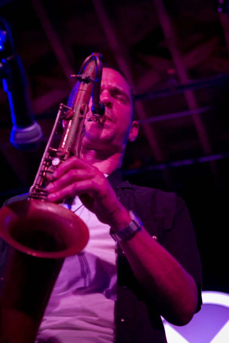 Matthew Busch playing saxophone at Durham’s Motorco Music Hall in 2014. Photo by Alexandrea Lassiter/Copper Key Photo