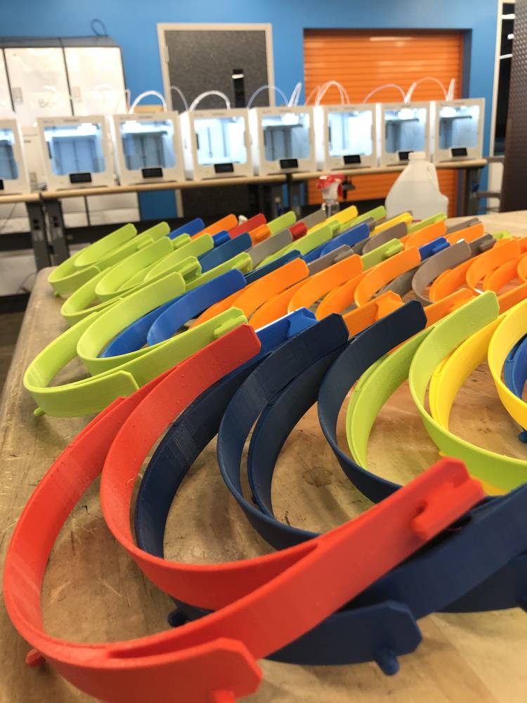 stacks of PLA headbands created at the 3D print lab