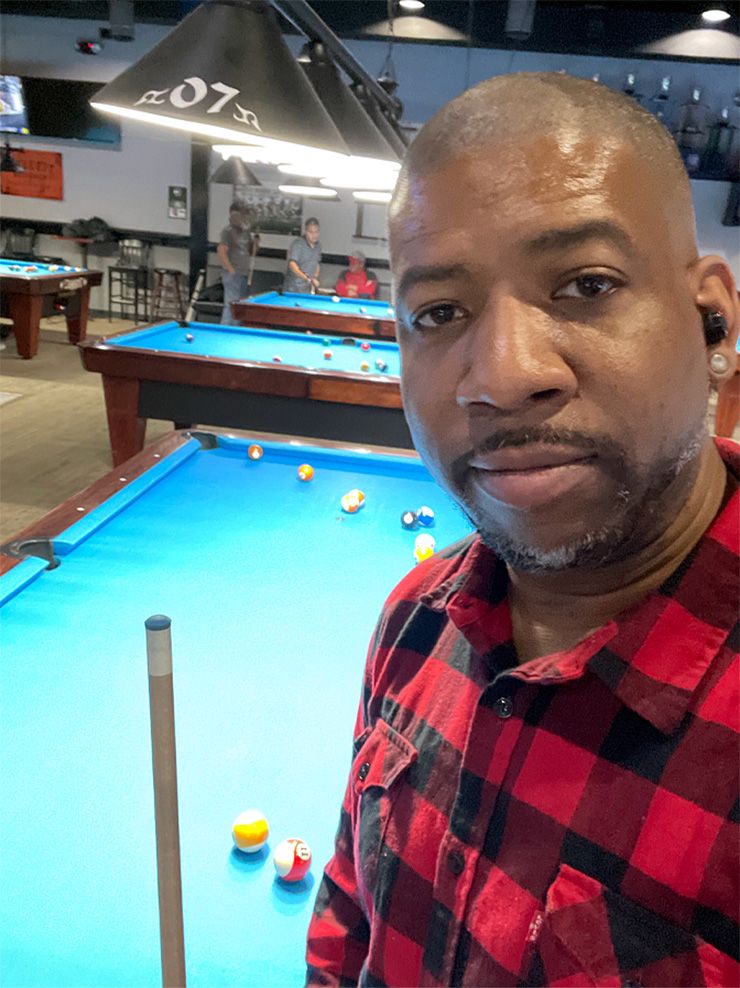 J. Brandon Johnson performs a shutdown routine to end his workday, so he can unwind playing pool after work. Photo courtesy of J. Brandon Johnson.