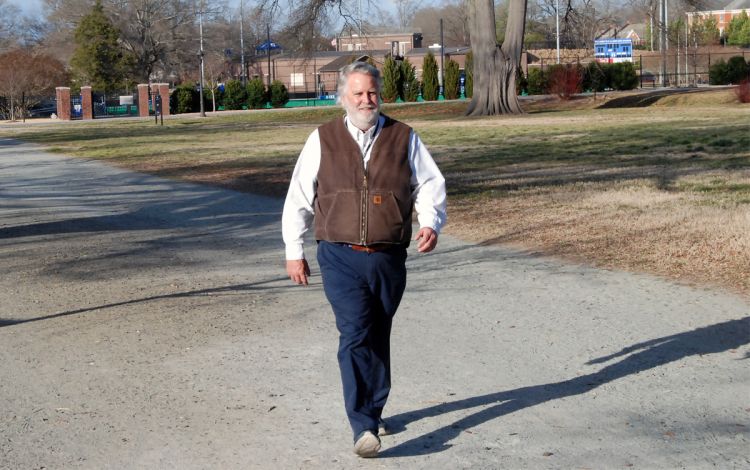 Jamie Palmer walks around the East Campus Loop at Duke to get some exercise. Photo by Jack Frederick.