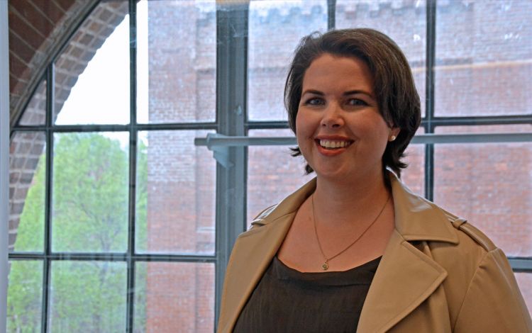 Mary McKee splits her work days between home and Duke OIT's space in the Power House. Photo by Stephen Schramm.