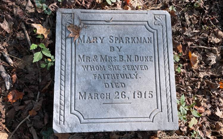 The headstone for Mary Sparkman, located in Geer Cemetery, was donated by her employers B.N. and Sarah Duke. Photo courtesy of Huiyin Zhou.