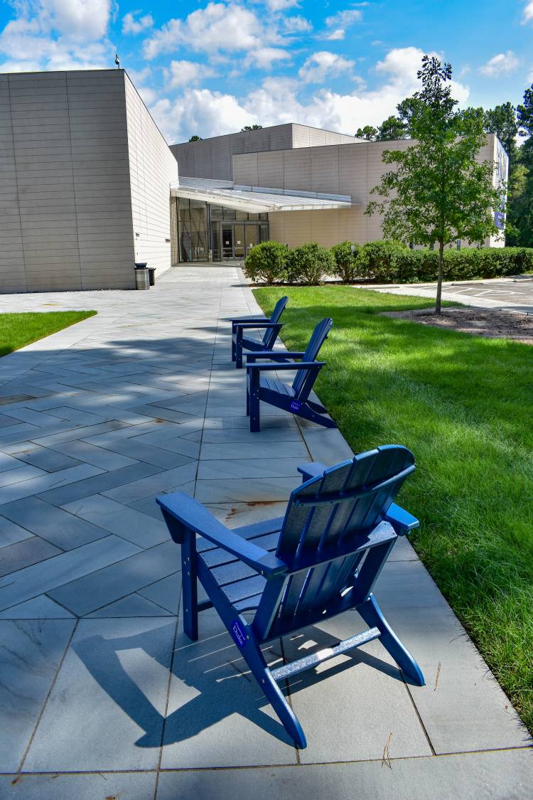New Adirondack chairs line the pathway leading to the Nasher Museum of Art. Photo by Mark Hough.