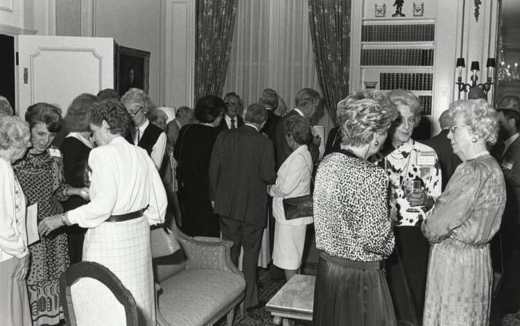 In early 1987, alumni gather to celebrate the recently completed renovations to the East Duke Parlors. Photo courtesy of Duke University Archives.