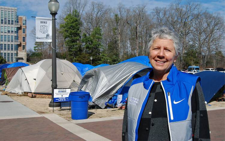 Chris Pipkin of Duke Recreation and Physical Education walks past Krzyzewskiville each day when she comes to work. Photo by Stephen Schramm.