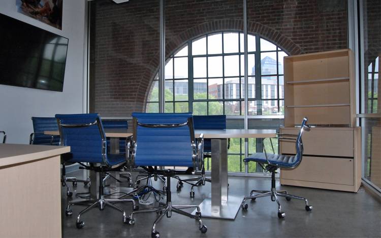In addition to desks, the Powerhouse features meeting rooms and individual offices. Photo by Stephen Schramm.