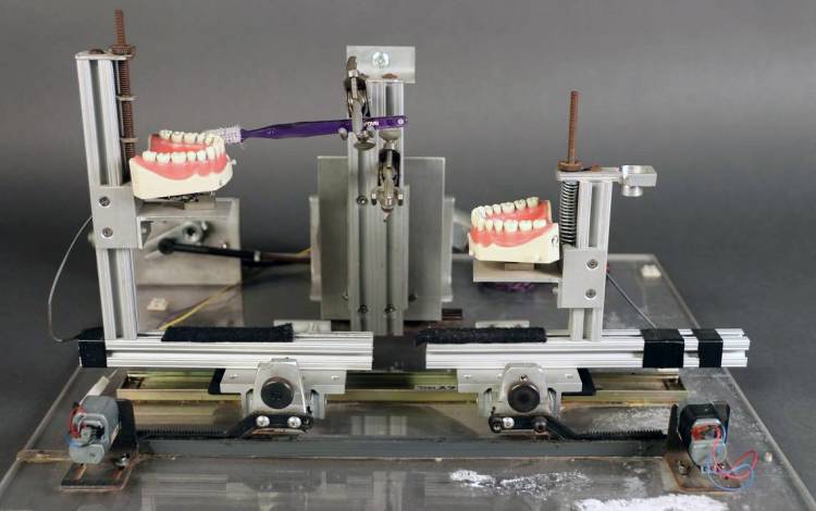 The collection includes a variety of original testing equipment designed and used by Consumer Reports scientists, like this toothbrush tester with false teeth. Photo courtesy of University Communications.