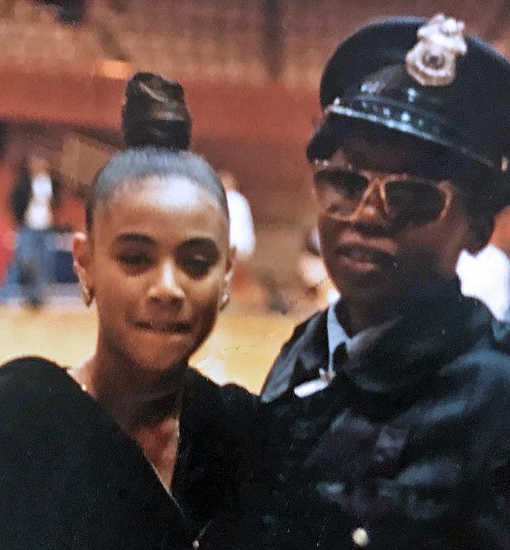 Early in her career, Ruby Thompkins worked as a security officer. Here she is working in that role at a Duke basketball game, where she grabbed a photo with actress Jada Pinkett-Smith, left, who was there as a fan. Photo courtesy of Ruby Thompkins.