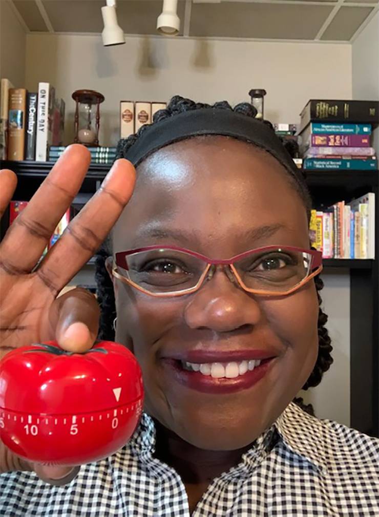 Sabrina Thomas uses a timer in the shape of a tomato at her home office to practice the Pomodoro Technique. Photo courtesy of Sabrina Thomas.