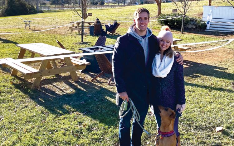 Sara Wakefield and her husband, Josh Herb, enjoy exploring the area with their dog, Bella. Photo courtesy of Sara Wakefield.