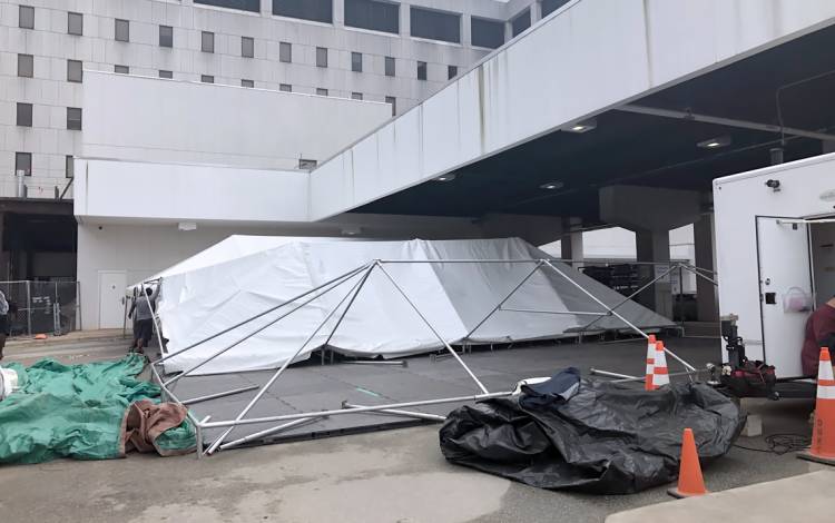 The frame for one of Duke Regional’s four triage tents rests under the hospital’s ambulance bay on March 19. Photo courtesy of Duke Regional Hospital.