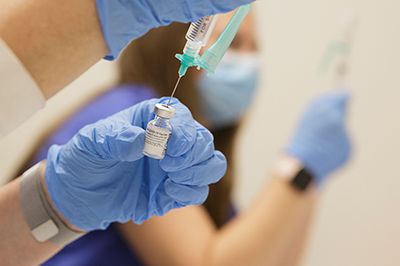 Duke nurses prepare COVID-19 vaccines for patients on Jan. 6, 2021. Photo by Shawn Rocco