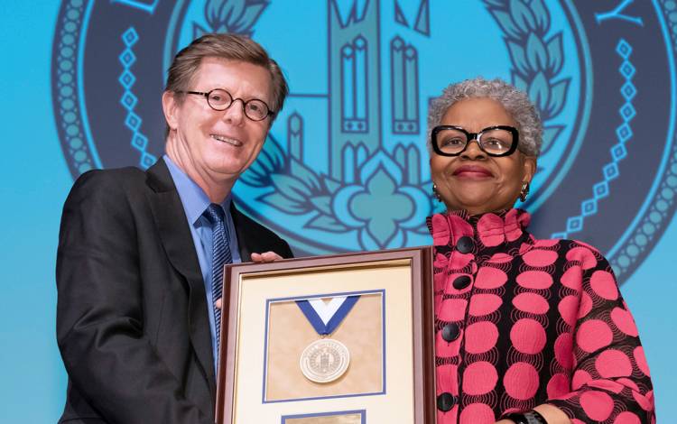 Duke University President Vincent E. Price and Presidential Award winner Zoila Airall. Photo by Les Todd.