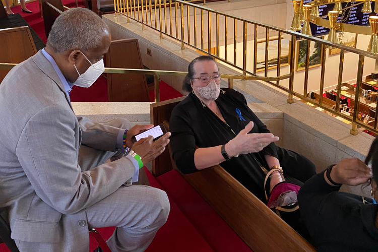 Former Durham Mayor Bill Bell talks with MaryAnn’s sister, Barbara.