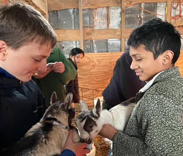 John Hope Franklin Young Scholars on a retreat at the Celebrity Dairy Goat Farm. 