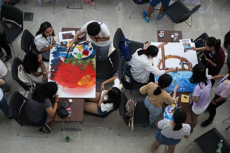 DKU students engage in a painting activity Wednesday at Duke Kunshan University. 