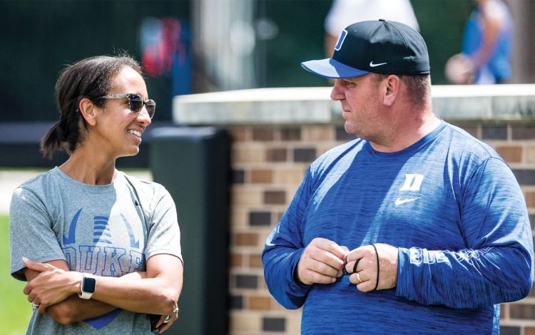 Duke director of Athletics Nina King speaks with Mike Elko during fall camp in August. Photo courtesy of Duke Athletics.