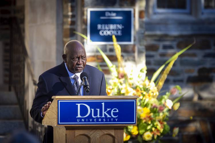 Gene Kendall speaks at the Reuben-Cooke Building dedication.