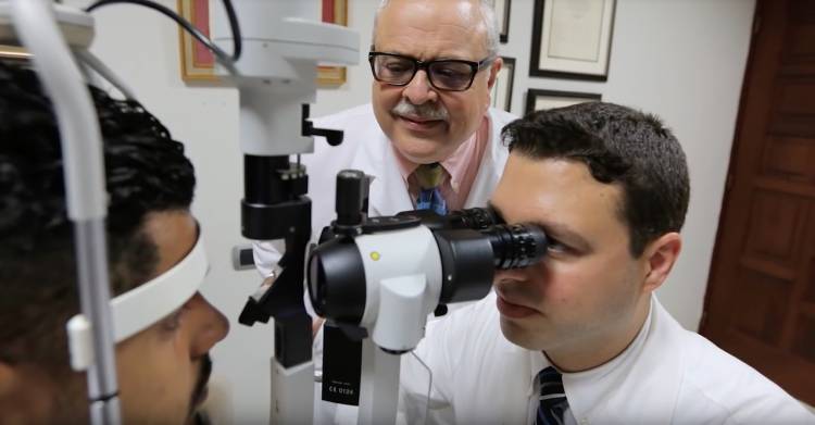 Juan Batlle '78, MD'79 teaches eye doctors at the Elias Santana Hospital in the Dominican Republic.