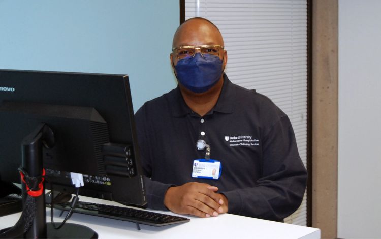 DeShane Watson is in charge of servicing the computers in the Sealey G. Mudd Building. Photo by Jack Frederick.