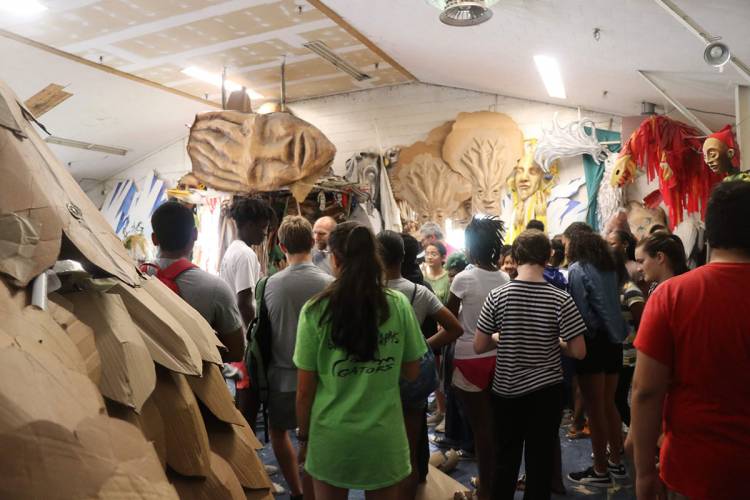 Scholars visit the Paperhand Puppet Intervention studio in preparation for their study of Islamic puppetry.