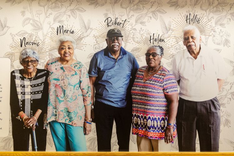 The exhibit covers entire walls of the West End Center. Photo by Erin Bell