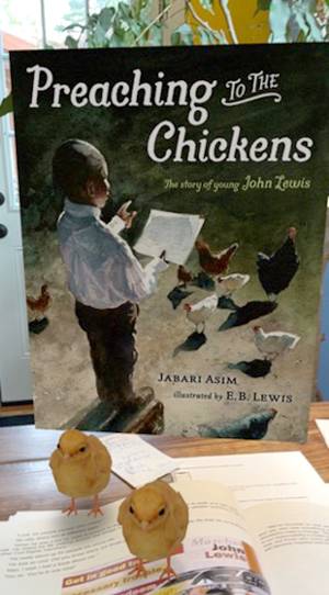 Augmented reality feature in a section of the book about John Lewis, who wants to be a preacher when he grows up, and he preaches to chickens as a six-year-old. Photo by David Stein