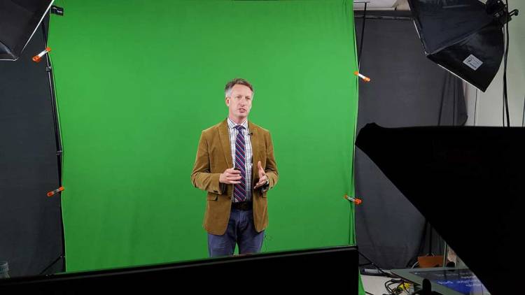 Steve Taylor, MD, Assistant Professor Medicine and Assistant Research Professor of Global Health, films a video for a course called Infectious Disease Epidemiology in Global Settings. The course was the first fully online graduate-level course offered by the the Duke Global Health Institute.