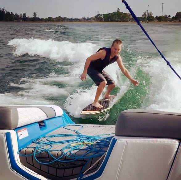 Gregory Samanez-Larkin wakeboarding off the Miami coast