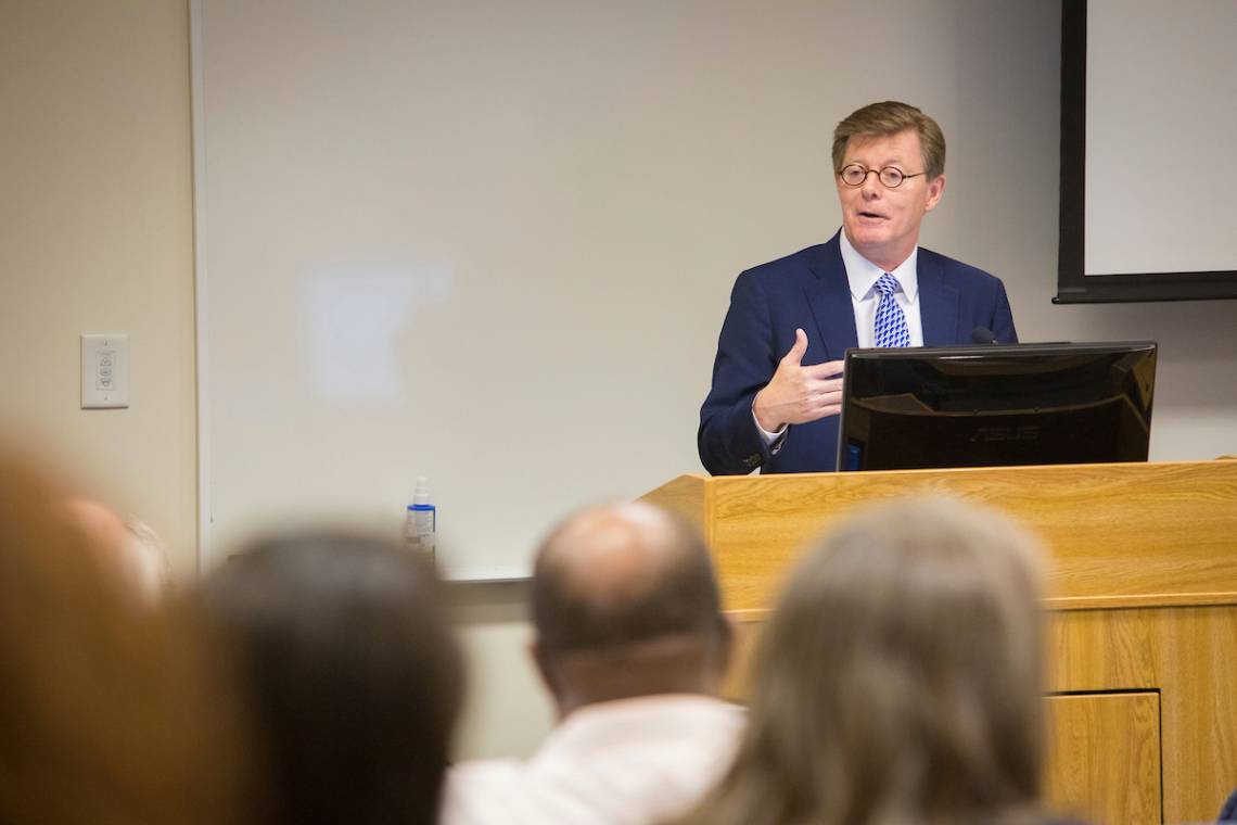 President Vincent Price addresses the faculty Thursday at the Academic Council. Photo by Bill Snead