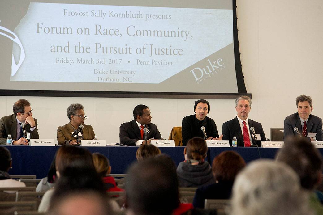 Scholars, police officers and activists speak at a session on community-police interactions. Photo by Jared Lazarus/Duke Photography