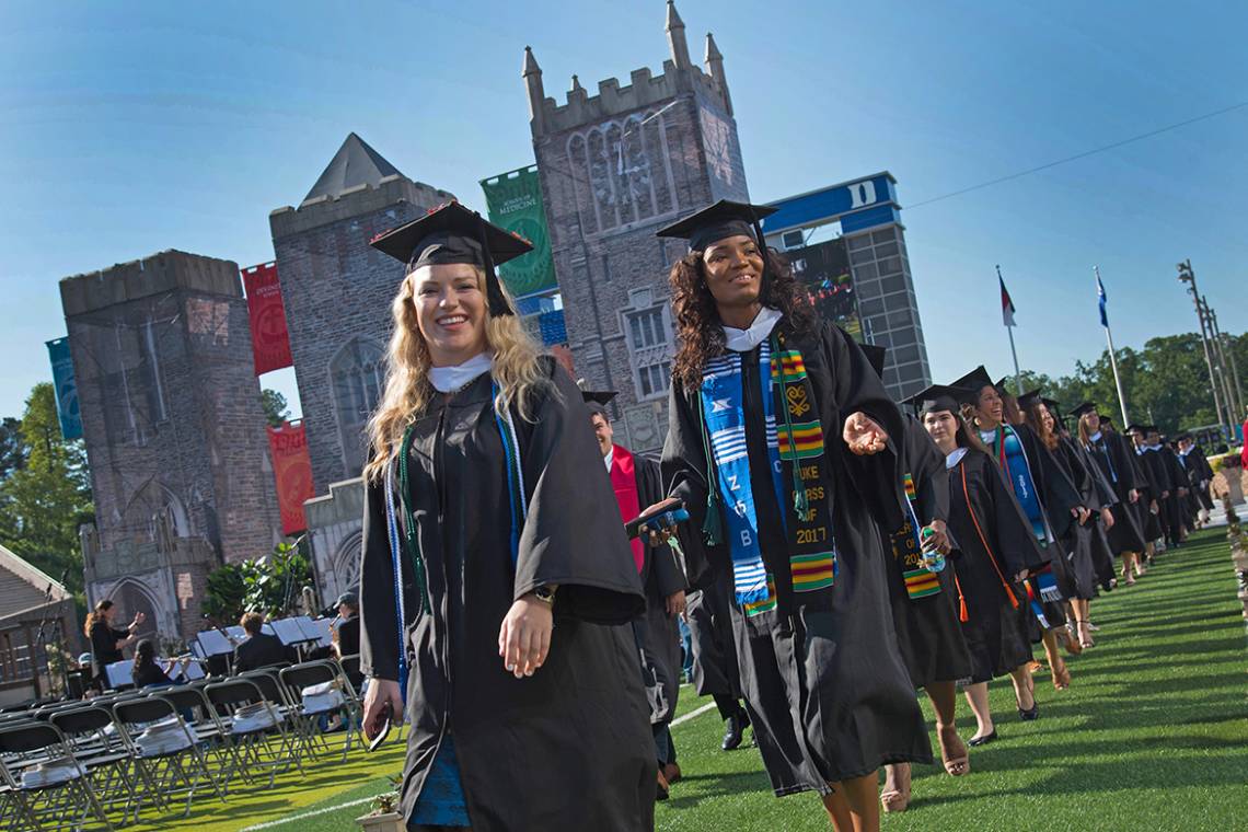 Students proceed through Wallace Wade Stadium during the 2017 commencement ceremony.