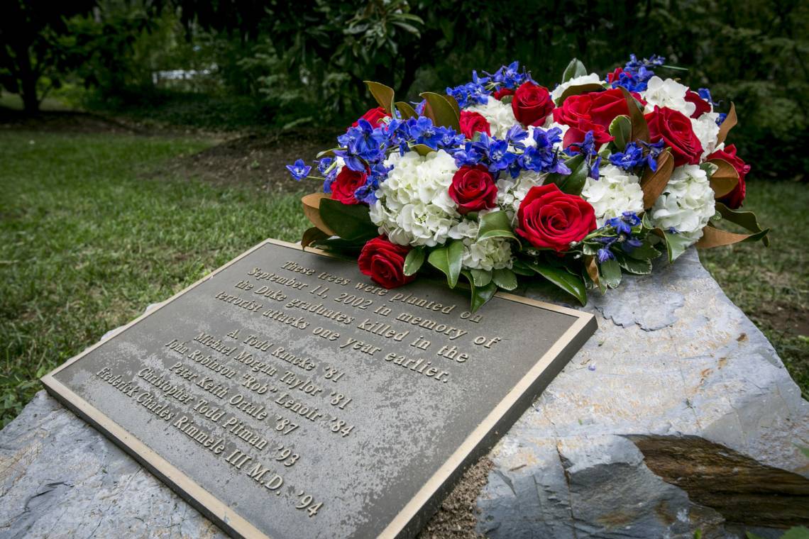 Memorial plaque on Keohane Quad that honors the six alumni killed in the 9/11 attacks.