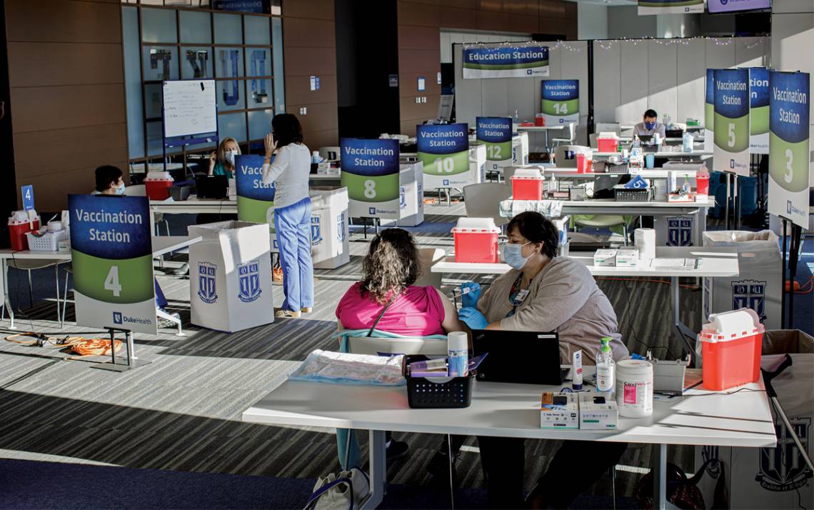 Morning sunshine pours through windows of Blue Devil Tower club area, where staff and faculty receive the COVID-19 vaccine.