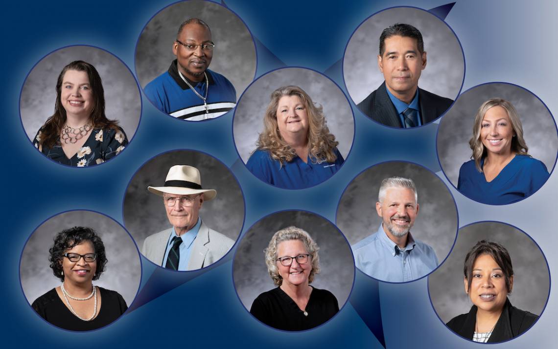 Ten headshots against the blue background.