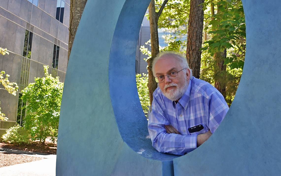 Balfour Smith in the Beber Sculpture Garden at Duke Law. Photo by Beth Hatcher.
