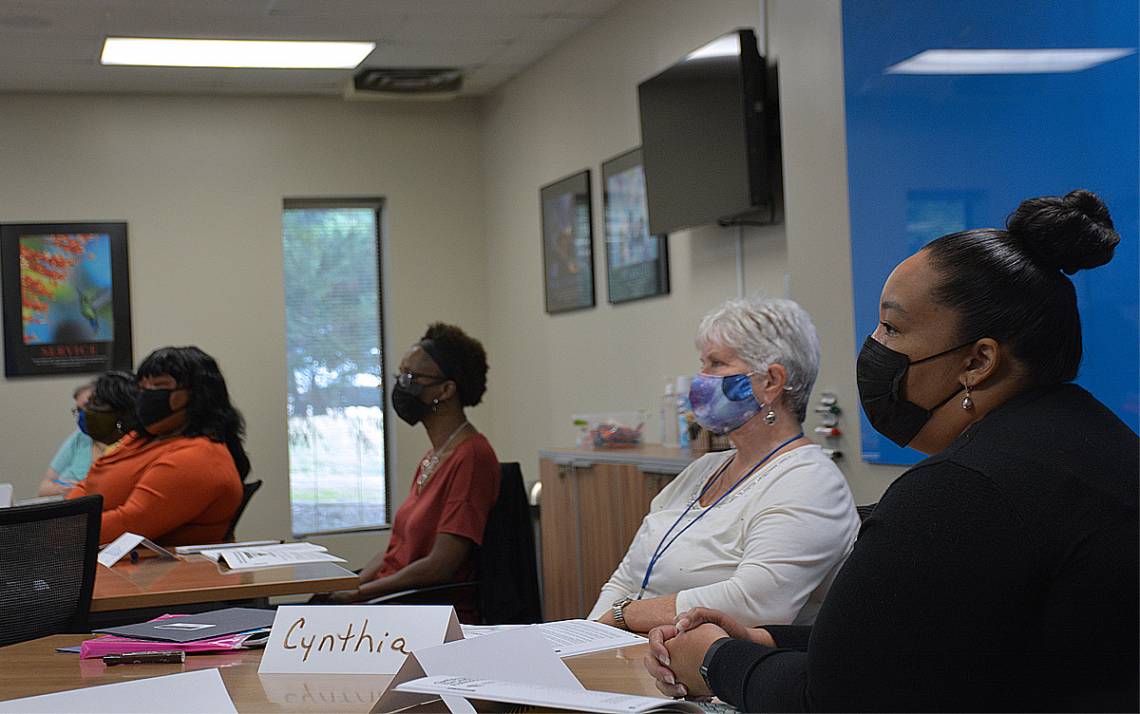 Members of the Certified Executive Administrative Professional program listen to a presentation. Photo by Stephen Schramm.