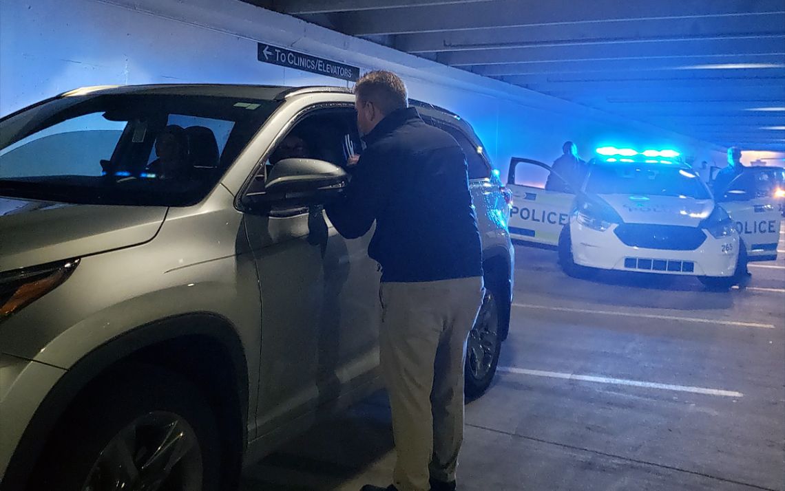 Participants in the Duke Citizens Police Academy, a popular part of the Duke University Police Department's community outreach efforts, take part in a simulated traffic stop. Photo courtesy of the Duke University Police Department.